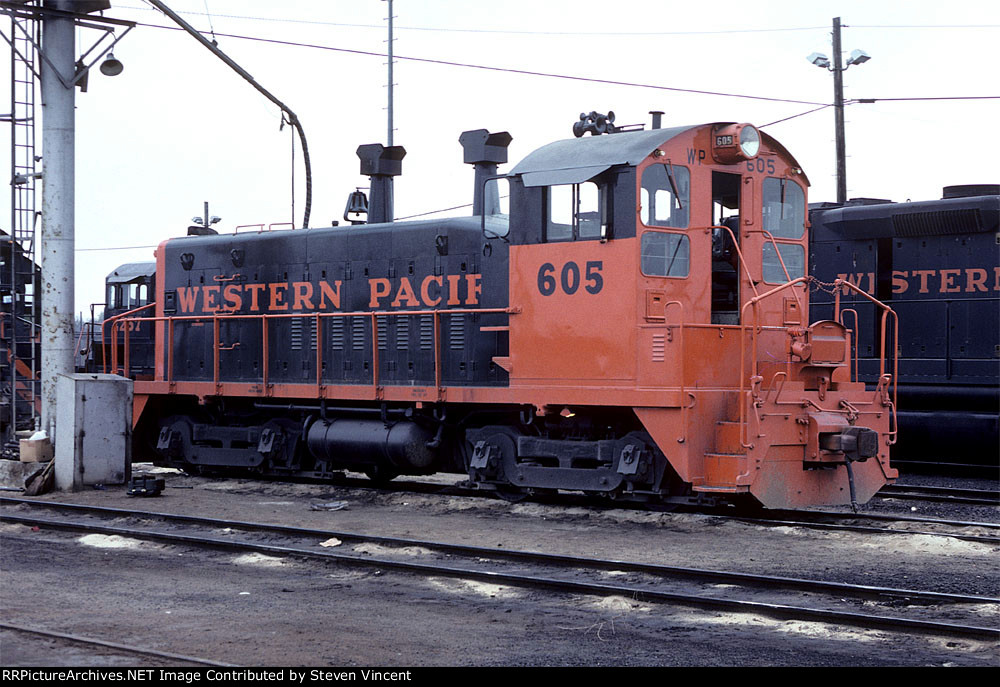 Western Pacific SW9 #605 with orange cab.